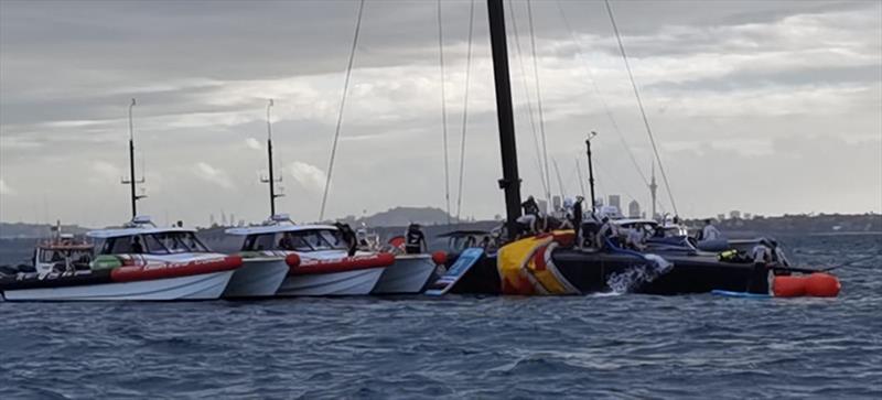 The situation is stabilised for NYYC American Magic's Patriot after a huge capsize on day 3 of the PRADA Cup photo copyright Richard Gladwell / Sail-World.com taken at  and featuring the AC75 class