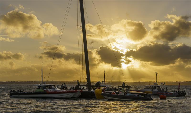 The America's Cup support teams work together to save NYYC American Magic's Patriot after a huge capsize on day 3 of the PRADA Cup photo copyright COR36 / Studio Borlenghi taken at  and featuring the AC75 class