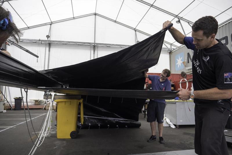 Designers check the double skin mainsail for the prototype - Emirates Team New Zealand testing a soft wing concept sail in Auckland, New Zealand, February 2018 - photo © Hamish Hooper