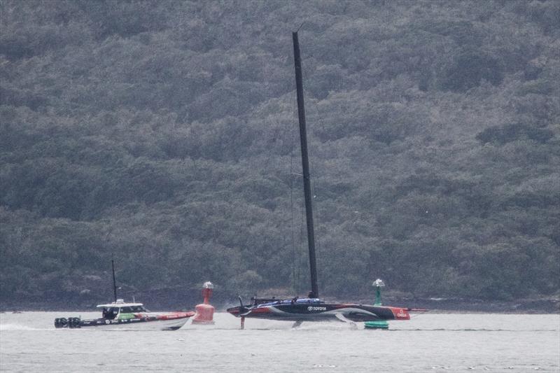 Emirates Team New Zealand tows home after a premtaure end to their training session on the Hauraki Gulf, October 8, 2019 photo copyright Richard Gladwell taken at Royal New Zealand Yacht Squadron and featuring the AC75 class