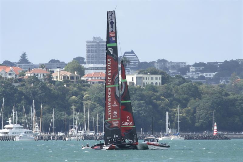 Emirates Team New Zealand's AC75 alongside a chase boat in the 'side-slip' position at the entrance to the inner Waitemata Harbour - January 10, 2019 - photo © Richard Gladwell / Sail-World.com