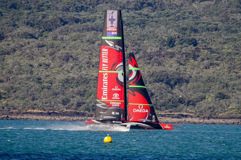 Emirates Team New Zealand's Te Aihe flies down the Rangitoto shore after a training session - Waitemata Harbour - January 15, 2020 photo copyright Richard Gladwell / Sail-World.com taken at Royal New Zealand Yacht Squadron and featuring the AC75 class