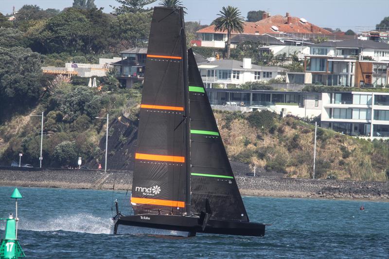 Emirates Team New Zealand's training boat Te Kaahu shot from North Head - one of the key landmarks from which to view the 2021 America's Cup photo copyright Richard Gladwell / Sail-World.com taken at Royal New Zealand Yacht Squadron and featuring the AC75 class