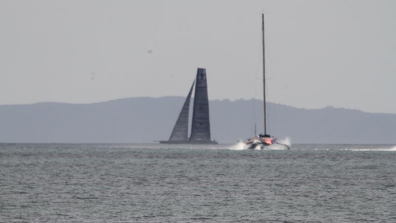 Defiant as Te Aihe tows home - Study shot - AC75 practice Hauraki Gulf - August 13, 2020 - 36th America's Cup photo copyright Richard Gladwell / Sail-World.com taken at Royal New Zealand Yacht Squadron and featuring the AC75 class