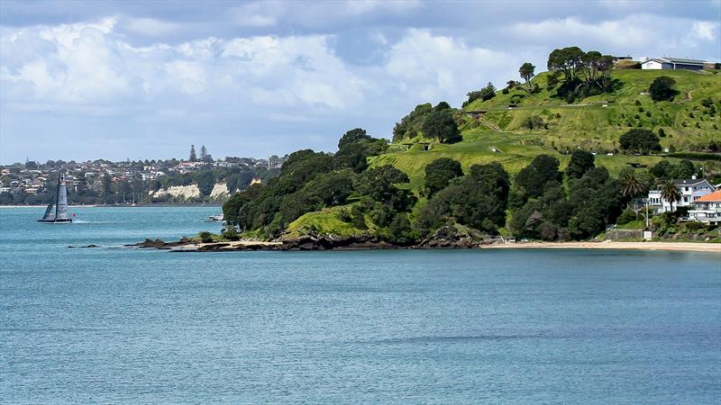 Defiant - AC75 - American Magic pops out from behind North Head, Devonport - Auckland - September 21, 2020 - 36th America's Cup photo copyright Richard Gladwell / Sail-World.com taken at Royal New Zealand Yacht Squadron and featuring the AC75 class