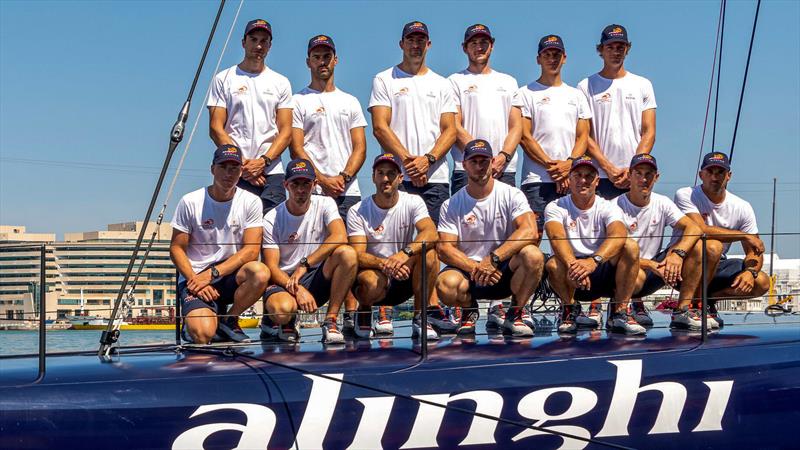 13 of the 15 Alinghi Red Bull Racing Sailing Squad on the foredeck of their AC75 Boat Zero - launch - Barcelona - August 8, 2022 photo copyright Alinghi Red Bull Racing taken at Société Nautique de Genève and featuring the AC75 class