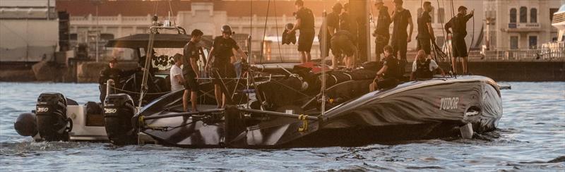 Boat Zero is towed back to the team base - Alinghi Red Bull Racing - Barcelona- August 2022 photo copyright Alinghi Red. Bull Racing taken at Société Nautique de Genève and featuring the AC75 class