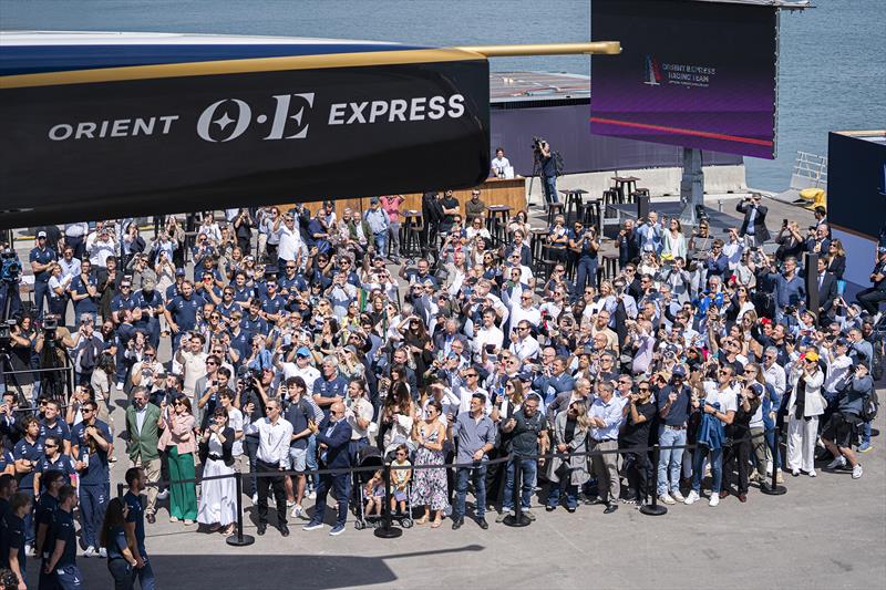 Orient Express Racing Team christen their AC75 race boat - photo © Pau Venteo / Orient Express Racing Team