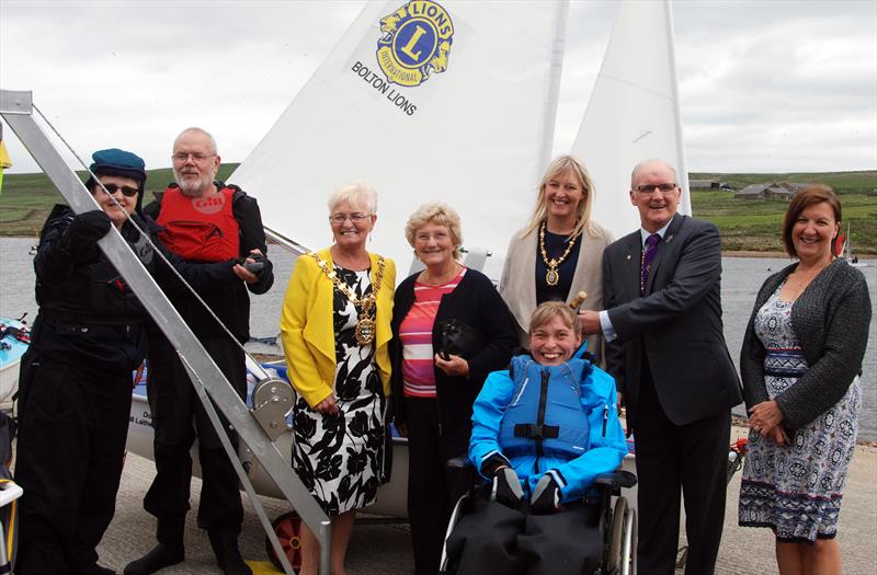 Jeff Hartley, President of Bolton Lions, Mrs Pam Laithwaite and other members of the Laithwaite family launched the new Sailability access boat during the Bolton Sailing Club Regatta Day 2018 photo copyright Andrew Craig taken at Bolton Sailing Club and featuring the Hansa class