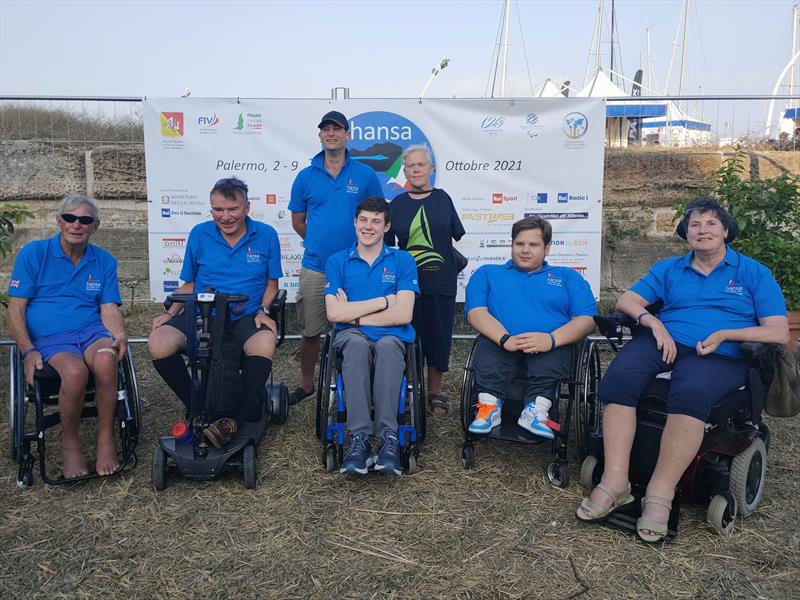 Our sailors (bottom l-r) Chris, Paul, Rory, Dennis, Tessa, (top l-r) Mike, Mary (IRL) during the 2021 Hansa World Championships at Palermo, Sicily photo copyright Clair Morris taken at  and featuring the Hansa class