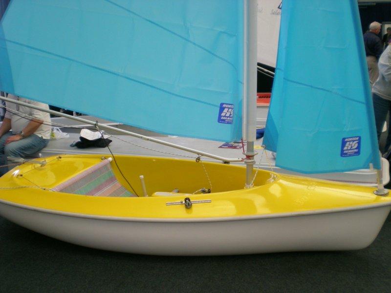 This small Access dinghy has a simple seat and is steered by a central upright lever photo copyright Magnus Smith / www.yachtsandyachting.com taken at RYA Dinghy Show and featuring the Hansa class