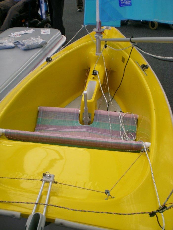 This small Access dinghy has a simple seat and is steered by a central upright lever photo copyright Magnus Smith / www.yachtsandyachting.com taken at RYA Dinghy Show and featuring the Hansa class