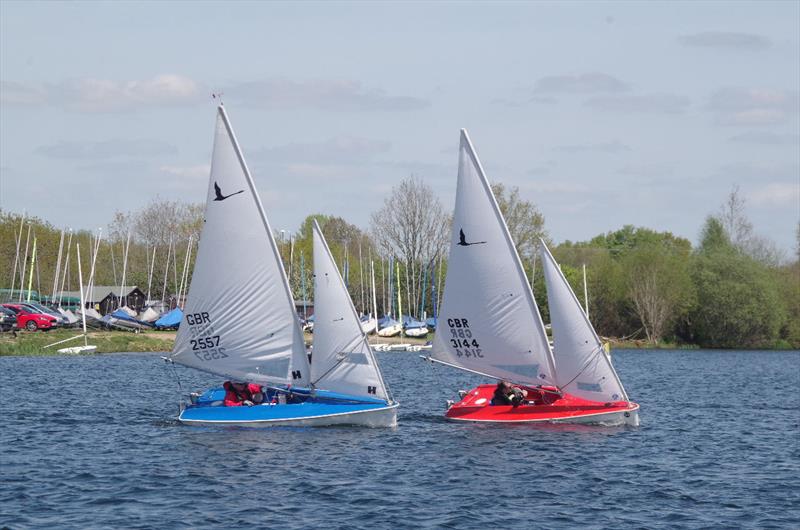 Paul and David enjoying close racing during the New Forest Sailability Hansa TT photo copyright Chris Wales taken at Spinnaker Sailing Club and featuring the Hansa class
