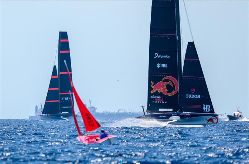 Hansa sailing with AC40s in the background photo copyright World Sailing taken at  and featuring the Hansa class