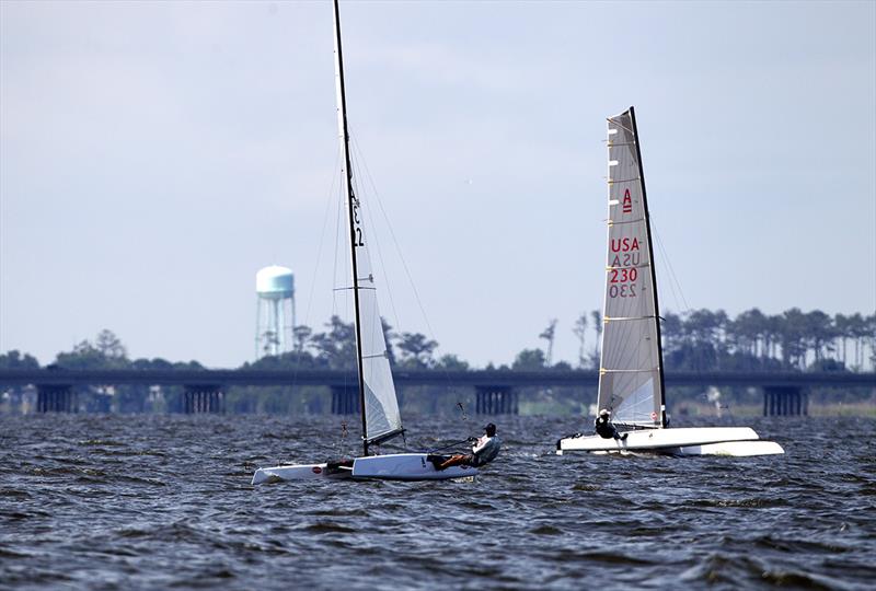 Racing on day 4 of the A Class Catamaran North American Championship photo copyright Richard Langdon / www.oceanimages.co.uk taken at SailNC and featuring the A Class Catamaran class