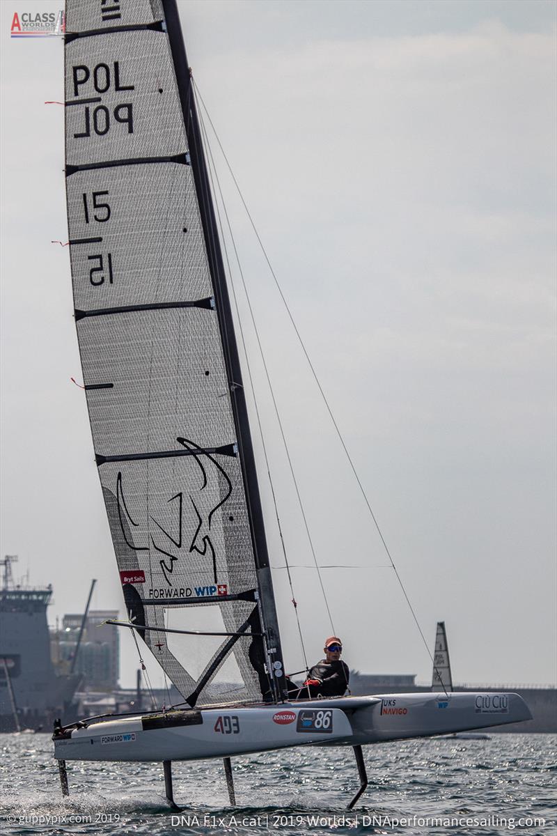 Tymo Bendyk flies to the finish in fine style on day 3 of the A Class Cat Worlds at the WPNSA photo copyright Gordon Upton / www.guppypix.com taken at Weymouth & Portland Sailing Academy and featuring the A Class Catamaran class