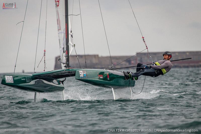 US National Champion Bruce Mahoney at the finish by was disqualified under the U flag penalty on day 4 of the A Class Cat Worlds at the WPNSA photo copyright Gordon Upton / www.guppypix.com taken at Weymouth & Portland Sailing Academy and featuring the A Class Catamaran class