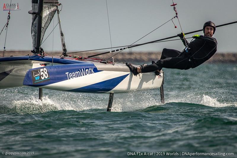 Nils Palmieri looking for the finish during the A Class Cat Worlds at the WPNSA photo copyright Gordon Upton / www.guppypix.com taken at Weymouth & Portland Sailing Academy and featuring the A Class Catamaran class