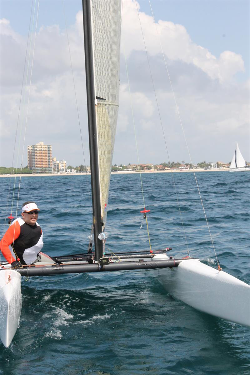 Brett Moss during the Hospice by the Sea Regatta photo copyright Hospice by the Sea taken at Coral Ridge Yacht Club and featuring the A Class Catamaran class