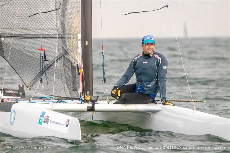 GBR Olympian Adam May had a good first race, but was a victim of the weed on the second on day 3 of the A Class Catamaran European Championships in Warnemunde photo copyright Gordon Upton / www.guppypix.com taken at  and featuring the A Class Catamaran class