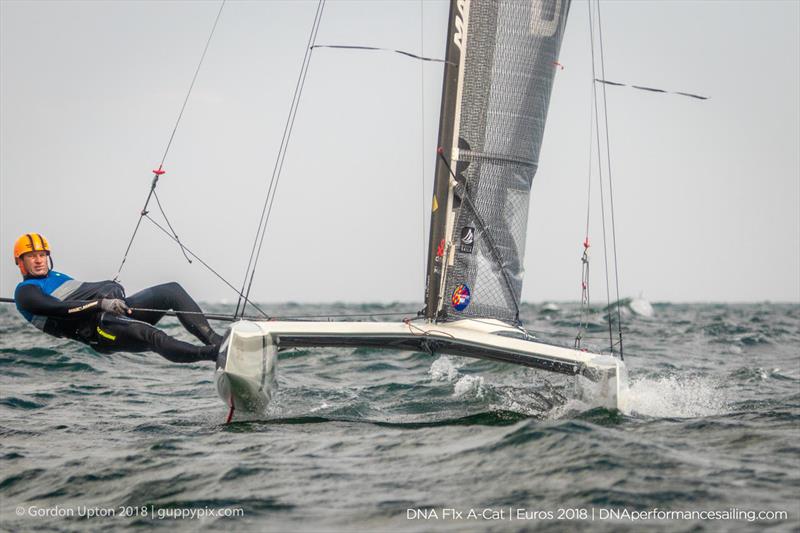 Mischa Heemskerk enjoys the breeze on the way home with racing cancelled on final day of the A Class Catamaran European Championships in Warnemunde photo copyright Gordon Upton / www.guppypix.com taken at  and featuring the A Class Catamaran class