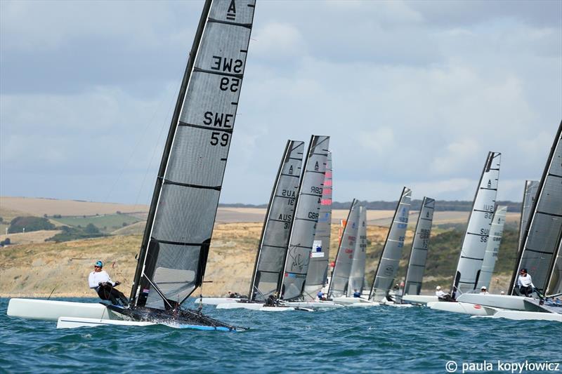 The start of the ‘A' Cat Classic Division race 2 - Alberto Farnessi SWE 59 nails the pin - A Class Cat GBR National Championships at Weymouth photo copyright Paula Kopylowicz Exploder taken at Weymouth & Portland Sailing Academy and featuring the A Class Catamaran class