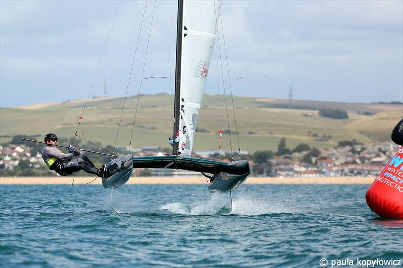 USA National Champion Bruce Mahoney foils upwind to the top mark - A Class Cat GBR National Championships at Weymouth photo copyright Paula Kopylowicz Exploder taken at Weymouth & Portland Sailing Academy and featuring the A Class Catamaran class