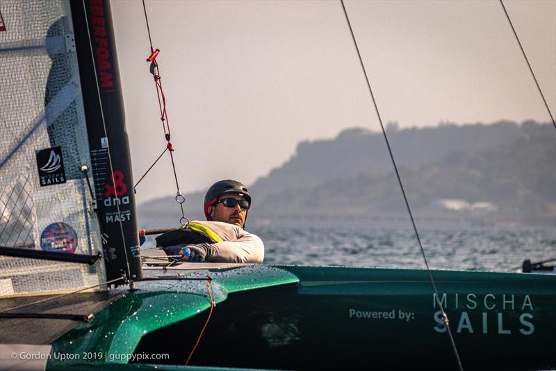 US National Champion, Bruce Mahoney, has home advantage and is fast on these waters in the Open Division photo copyright Gordon Upton / www.guppypix.com taken at Houston Yacht Club and featuring the A Class Catamaran class