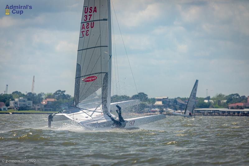 Michael Christensen's stylish crowd pleasing dismount at the A Cat Admiral's Cup 2022 photo copyright Gordon Upton / www.guppypix.com taken at Houston Yacht Club and featuring the A Class Catamaran class