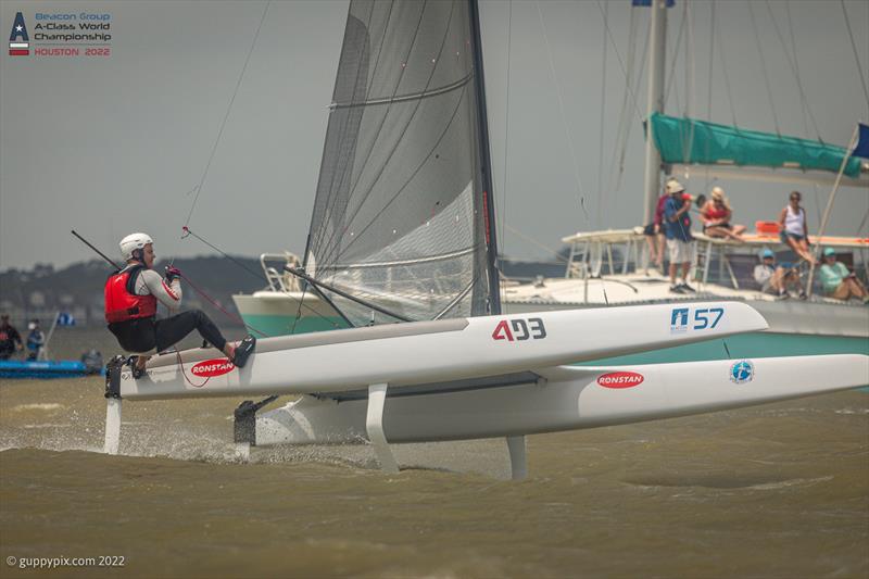 Bundy chasing well at the finish on day 2 of the Beacon Group A-Class Catamaran World Championships in Texas photo copyright Gordon Upton / www.guppypix.com taken at Houston Yacht Club and featuring the A Class Catamaran class