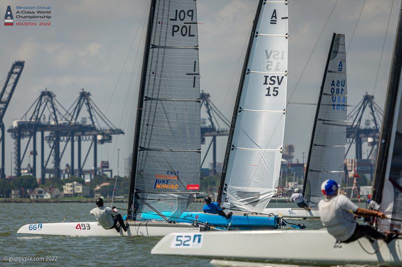 The fleet finally get going properly on the final day at the Beacon Group A-Class Catamaran World Championships in Texas photo copyright Gordon Upton / www.guppypix.com taken at Houston Yacht Club and featuring the A Class Catamaran class
