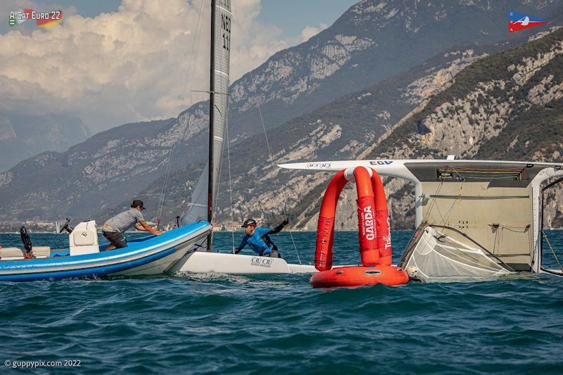 Spreader carnage in action - A-Class European Championships day 4 photo copyright Gordon Upton / www.guppypix.com taken at Circolo Vela Arco and featuring the A Class Catamaran class