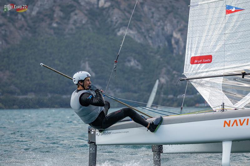 Kuba Surowiec POL 41 always pushing, finished 3rd on count-back to Mischa at the A-Class European Championships photo copyright Gordon Upton / www.guppypix.com taken at Circolo Vela Arco and featuring the A Class Catamaran class