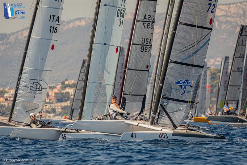 A-Cat Worlds at Toulon, France Day 1 - European Champion, Gustavo Doreste ESP 72, looks comfortable from the start photo copyright Gordon Upton / www.guppypix.com taken at Yacht Club de Toulon and featuring the A Class Catamaran class