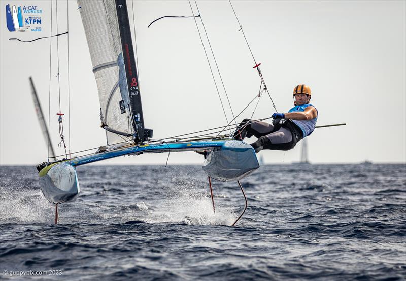 A-Cat Worlds at Toulon, France Day 2 - Misha on the finishing run in to make it 3 bullets photo copyright Gordon Upton / www.guppypix.com taken at Yacht Club de Toulon and featuring the A Class Catamaran class