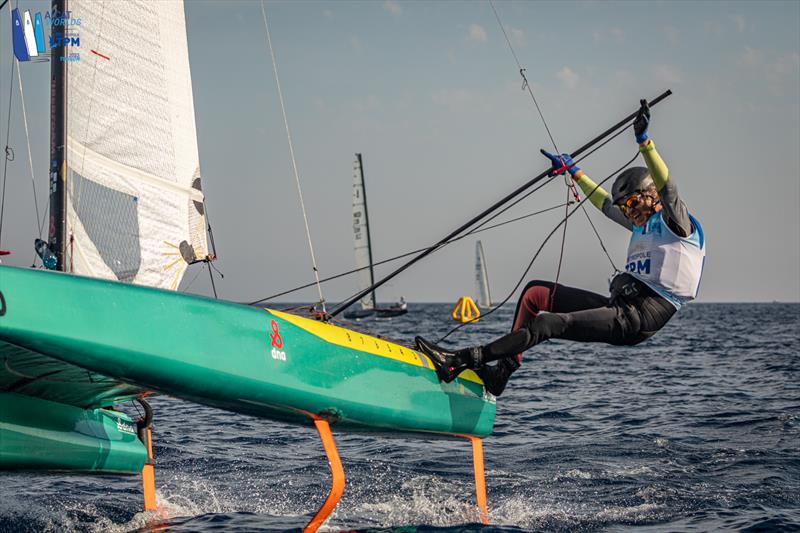 A-Cat Worlds at Toulon, France Day 3 - A happy Dutchman! PJ Dwarshuis enjoys his 'unexpected bullet' in the first race photo copyright Gordon Upton / www.guppypix.com taken at Yacht Club de Toulon and featuring the A Class Catamaran class