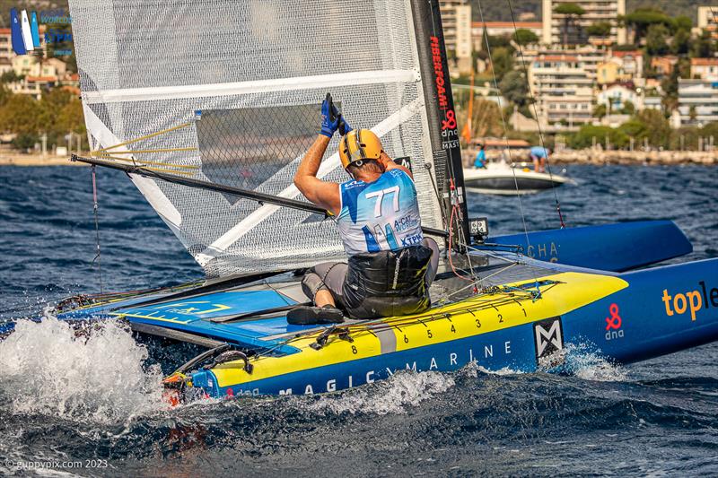 A-Cat Worlds at Toulon, France Day 6 - Misha Heemskerk applauds Kuba's victory in a hard fought final race photo copyright Gordon Upton / www.guppypix.com taken at Yacht Club de Toulon and featuring the A Class Catamaran class