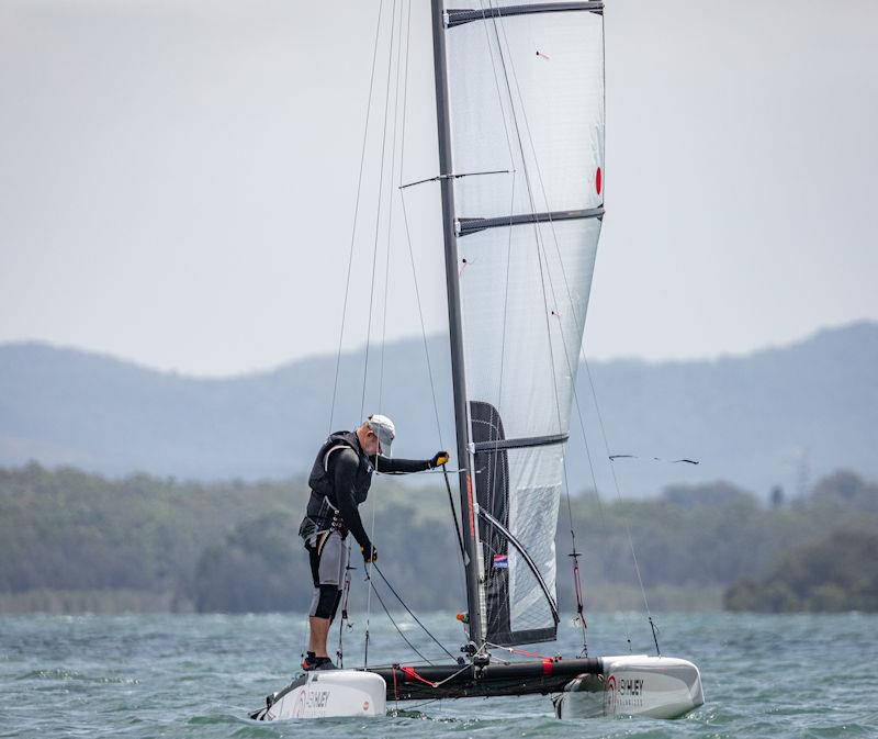 Australian A-Cat Nationals on Lake Macquarie Day 3 - Multiple World and Olympic medallist, Andrew Landenberger lying in second place photo copyright Gordon Upton / www.guppypix.com taken at South Lake Macquarie Amateur Sailing Club and featuring the A Class Catamaran class