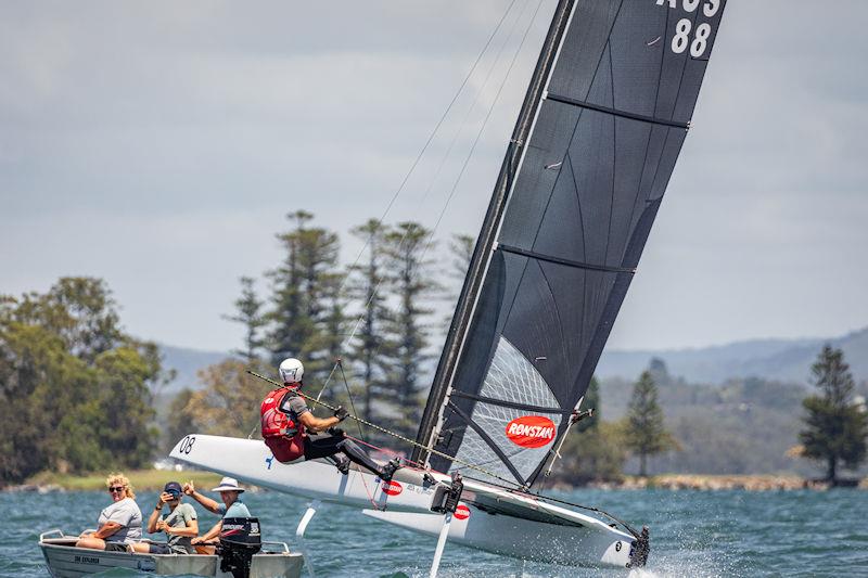 Australian A-Cat Nationals on Lake Macquarie Day 5 - Darren Bundock hot-dogs for the crowd as he wins the final Open race of the series - photo © Gordon Upton / www.guppypix.com