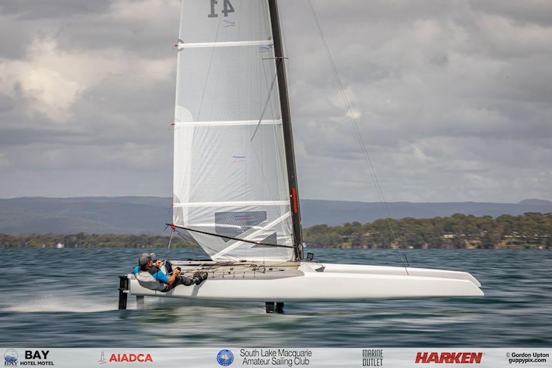 Australian A-Cat Nationals on Lake Macquarie Day 5 - Matt Homan rippin! photo copyright Gordon Upton / www.guppypix.com taken at South Lake Macquarie Amateur Sailing Club and featuring the A Class Catamaran class