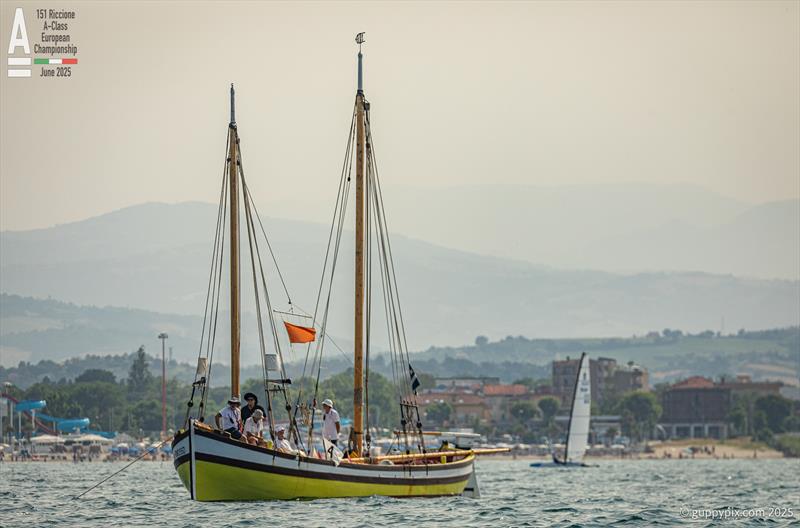 The Committee Boat is a historic preserved 1928 local fishing lugger - A-Class Cat European Championships at Riccione - Practice Race photo copyright Gordon Upton / www.guppypix.com taken at 151 Riccione  and featuring the A Class Catamaran class