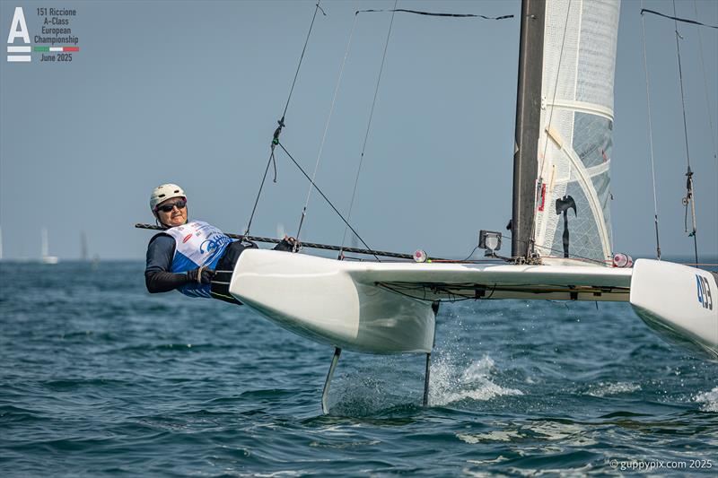 Marti Abdon Ibanez ESP 74 arrives at the finish in 3rd place in race 1 - A-Class Cat European Championships at Riccione Day 3 - photo © Gordon Upton / www.guppypix.com