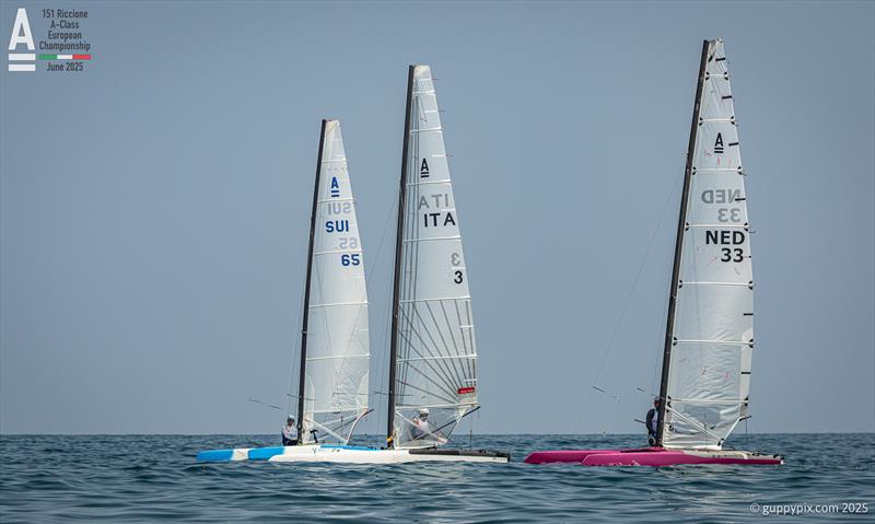 Charles Bueche SUI 65, Paulo Penco ITA 3 and Thijs Visser NED 33 ponder their life choices - A-Class Cat European Championships at Riccione Day 4 - photo © Gordon Upton / www.guppypix.com