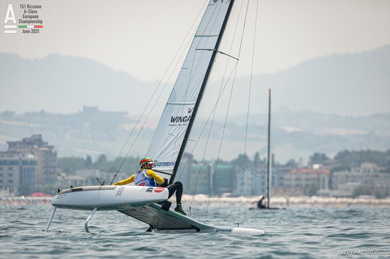 Lamberto Cesare ITA 13 tries everything to reduce the Open boat's drag - A-Class Cat European Championships at Riccione Day 4 photo copyright Gordon Upton / www.guppypix.com taken at 151 Riccione  and featuring the A Class Catamaran class