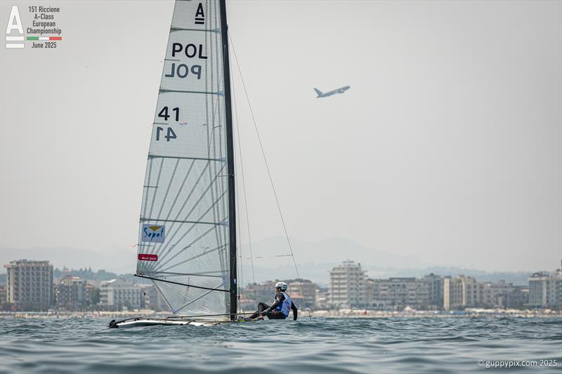Kuba Surowiec POL41 can only dream of flight today - A-Class Cat European Championships at Riccione Day 4 photo copyright Gordon Upton / www.guppypix.com taken at 151 Riccione  and featuring the A Class Catamaran class