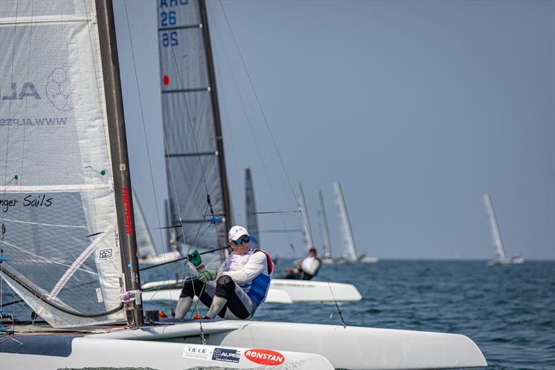The 79 year old sailing Hall Of Fame legend Ben Hall, USA still in the saddle and loving the Classic A-Cat - A-Class Cat European Championships at Riccione Day 5 - photo © Gordon Upton / www.guppypix.com