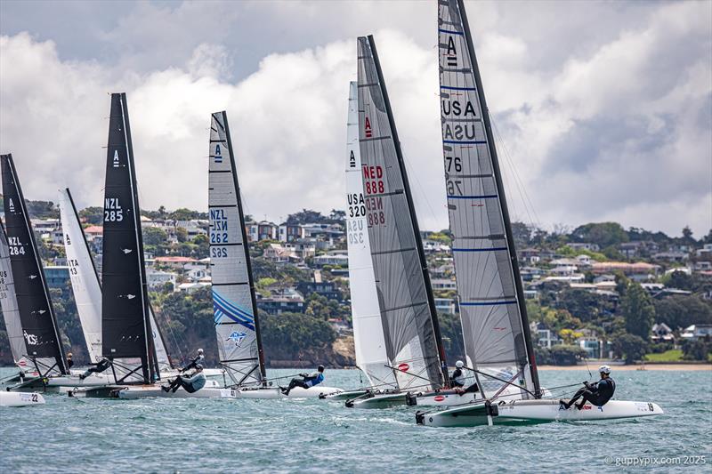 PredictWind A-Class Cat Worlds 2025 - An Open Fleet start in the four race warm up regatta photo copyright Gordon Upton / www.guppypix.com taken at Milford Cruising Club and featuring the A Class Catamaran class