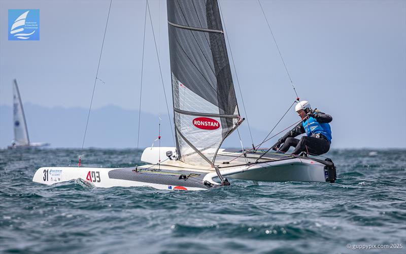 Carolijn Brouwer, had a great time in tricky conditions .- Day 5 Predictwind A-Class Catamaran World Championships - Milford, NZ - November 16, 2025 photo copyright Gordon Upton / www.guppypix.com taken at Milford Cruising Club and featuring the A Class Catamaran class