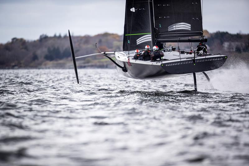  `The Mule` American Magic's surrogate boat in flight and canted to windward - photo © Amory Ross