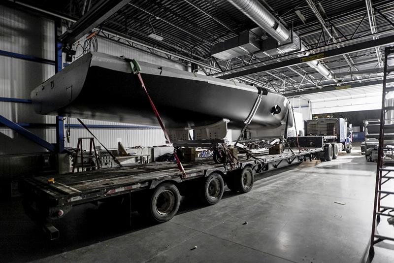  `The Mule` American Magic's surrogate boat exits the building facility photo copyright Amory Ross taken at New York Yacht Club and featuring the ACC class